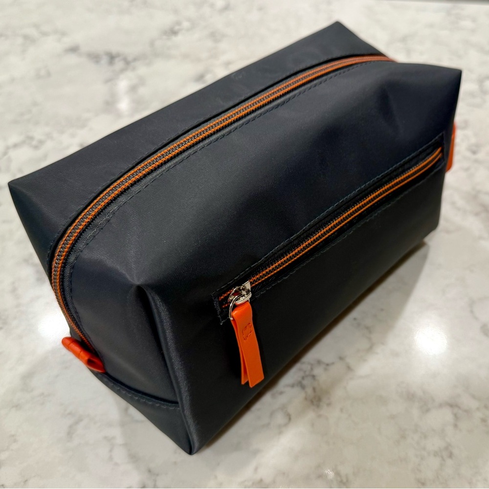 NWT! Toiletry travel bag. Zippered, carry loop, exterior and interior pocket